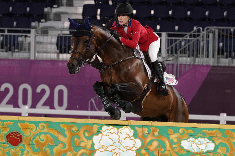 United States' Jessica Springsteen, riding Don Juan van de Donkhoeve, competes during the equestrian jumping individual qualifying at Equestrian Park in Tokyo at the 2020 Summer Olympics, Tuesday, Aug. 3, 2021, in Tokyo, Japan. (AP Photo/Carolyn Kaster)