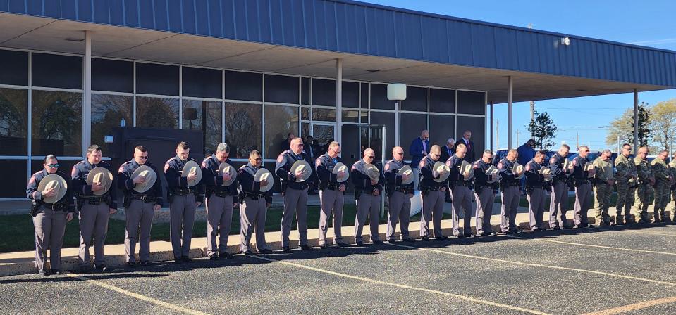 Troopers stand in unison Thursday at the Texas Panhandle War Memorial Center in Amarillo.