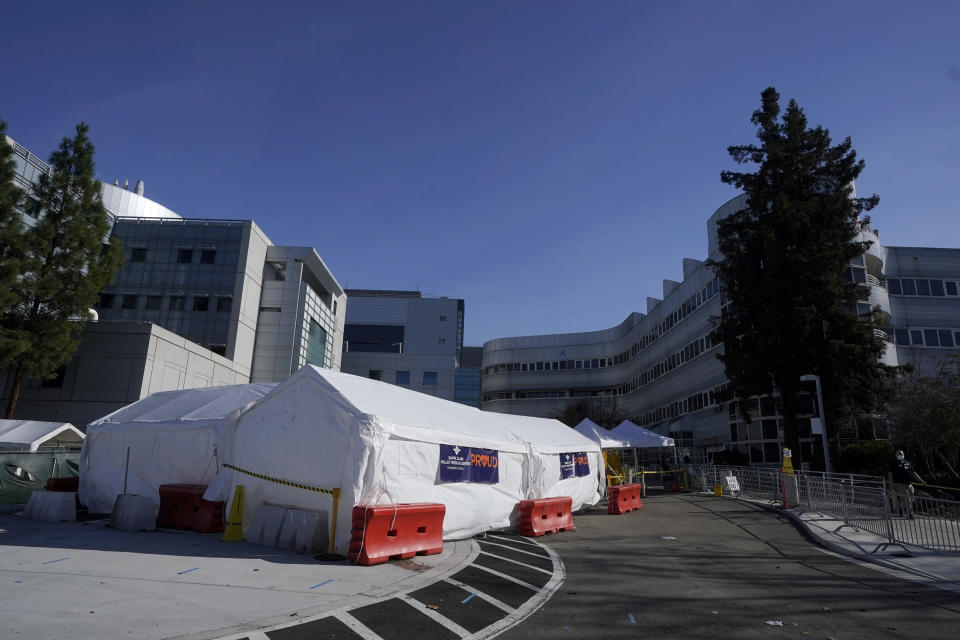 Tents are shown outside of Santa Clara Valley Medical Center during the coronavirus pandemic in San Jose, Calif., Wednesday, Jan. 13, 2021. (AP Photo/Jeff Chiu)