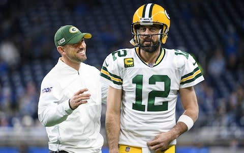 Green Bay Packers head coach Matt LaFleur (left) and quarterback Aaron Rodgers (12) before the game against the Detroit Lions at Ford Field - Credit: USA Today