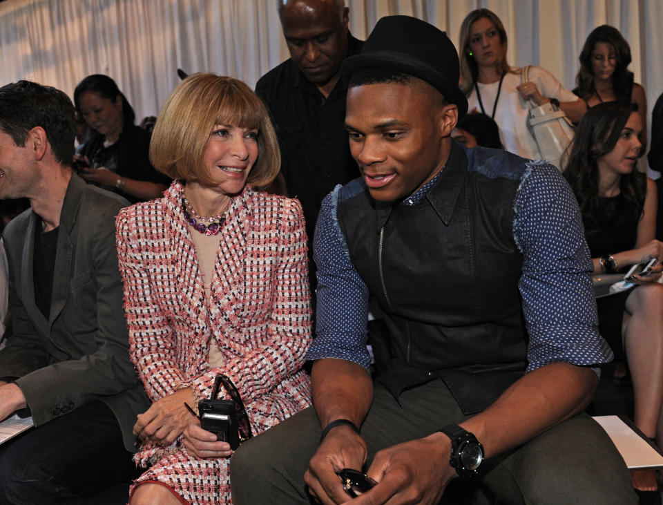 NBA basketball star Russell Westbrook, right, of the Oklahoma City Thunder, and Vogue's Anna Wintour attend the Rag & Bone Spring 2014 collection during Fashion Week, Friday, Sept. 6, 2013, in New York. (AP Photo/Louis Lanzano)