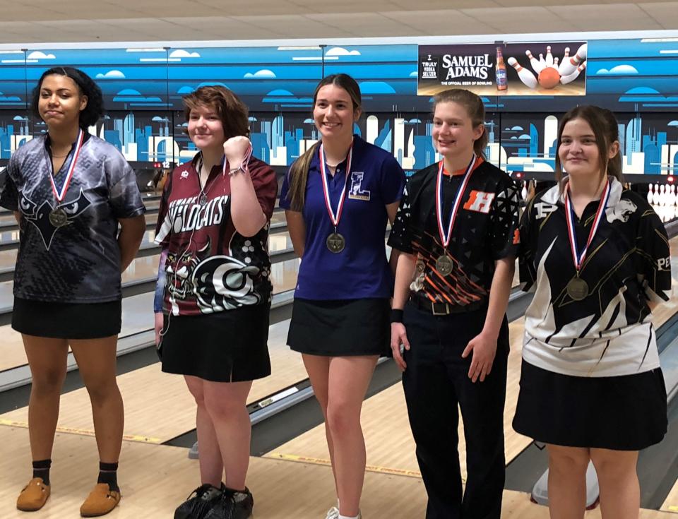 The girls all-tournament team at Saturday's 14-team Muskingum University Invitational at Park Lanes included, from left, Payton Hartgrove, Westerville Central (1st with 647); Newark's Jade Gabor (2nd with 630), Addyson Whitesel from Lexington (3rd with 542); Heath's Summer Mohler (4th with 522) and Ami King of Perry (5th with 522).