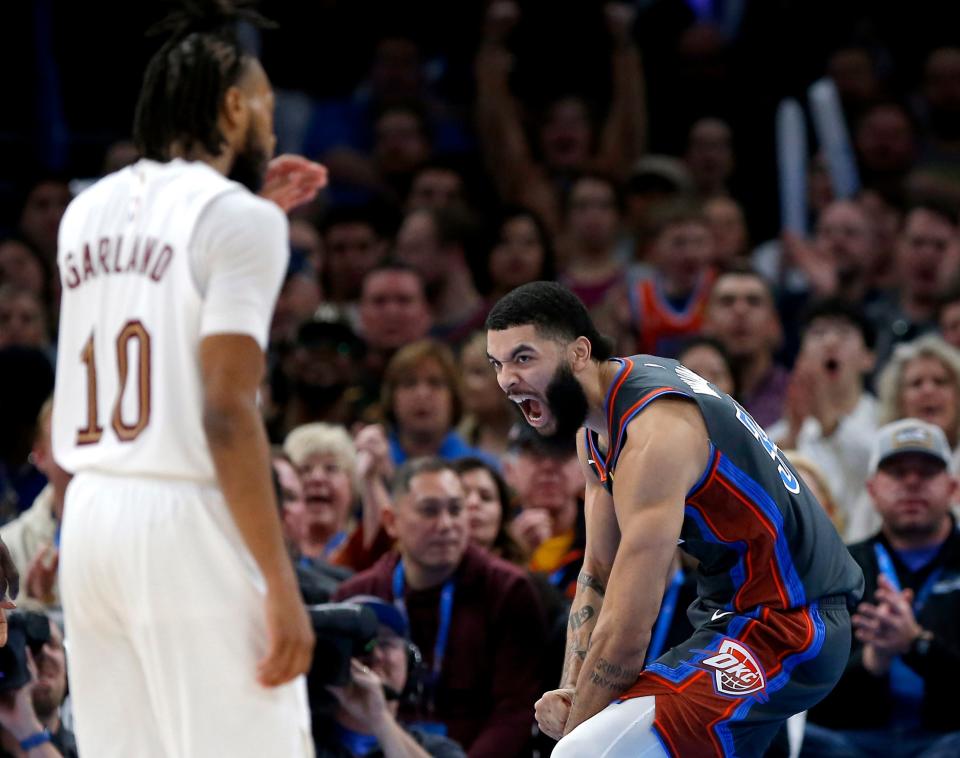 Oklahoma City's Kenrich Williams (34) celebrates a basket in front of Cleveland's Darius Garland (10) in the second half of a 112-100 win Friday night at Paycom Center.