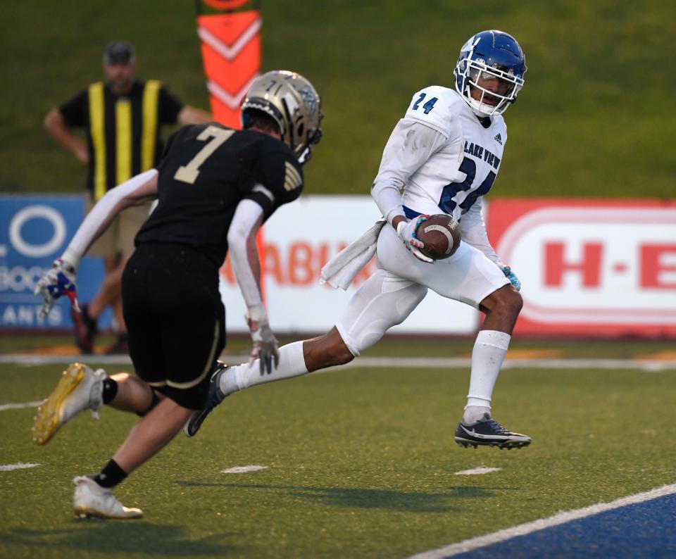 San Angelo Lake View's Derrick Taylor, right, prepares to score a touchdown against Lubbock High, Thursday, Sept. 15, 2022, at Lowrey Field At PlainsCapital Park. San Angelo Lake View won, 35-21.