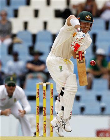 Australia's David Warner plays a shot during the third day of their cricket test match against South Africa in Centurion February 14, 2014. REUTERS/Siphiwe Sibeko