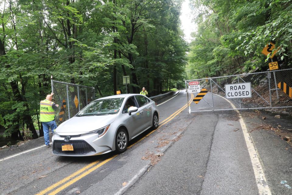 Engineers from the New York State DOT return from surveying the damage on Storm King Highway in Cornwall on July 10, 2023. A section of the road is washed out due to Sunday's severe rain and flooding. 