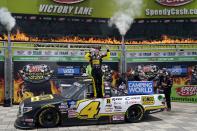 CORRECTS BYLINE TO TONY GUTIERREZ, NOT LARRY PAPKE - John Hunter Nemechek celebrates in Victory Lane after winning the NASCAR Truck Series auto race at Texas Motor Speedway in Fort Worth, Texas, Saturday, June 12, 2021. (AP Photo/Tony Gutierrez)