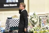 Formula One driver Nico Rosberg arrives to attend the funeral ceremony for late Marussia F1 driver Jules Bianchi at the Sainte Reparate Cathedral in Nice, France, July 21, 2015. Bianchi, 25, died in hospital in Nice on Friday, nine months after his crash at Suzuka in Japan and without regaining consciousness. REUTERS/Jean-Pierre Amet