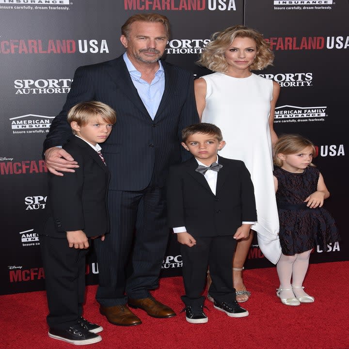 Actor Kevin Costner, wife Christine Baumgartner and children Grace Avery Costner, Hayes Logan Costner and Cayden Wyatt Costner arrive at the World Premiere of Disney's 'McFarland, USA'