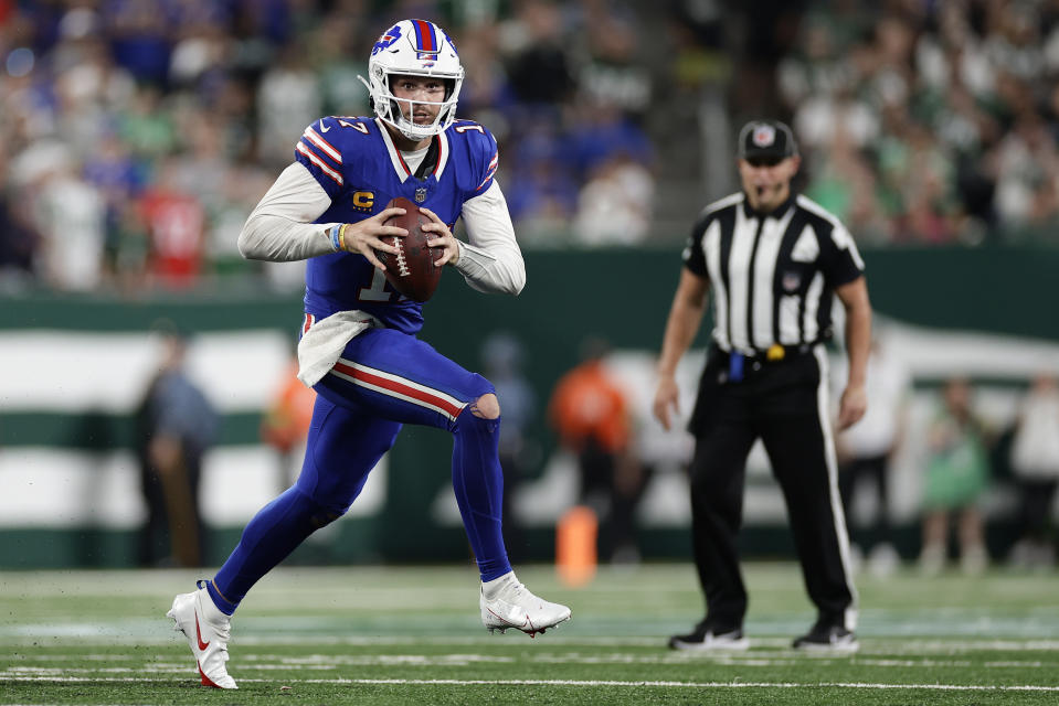 Buffalo Bills quarterback Josh Allen (17) carries the ball against the New York Jets during the second quarter of an NFL football game, Monday, Sept. 11, 2023, in East Rutherford, N.J. (AP Photo/Adam Hunger)