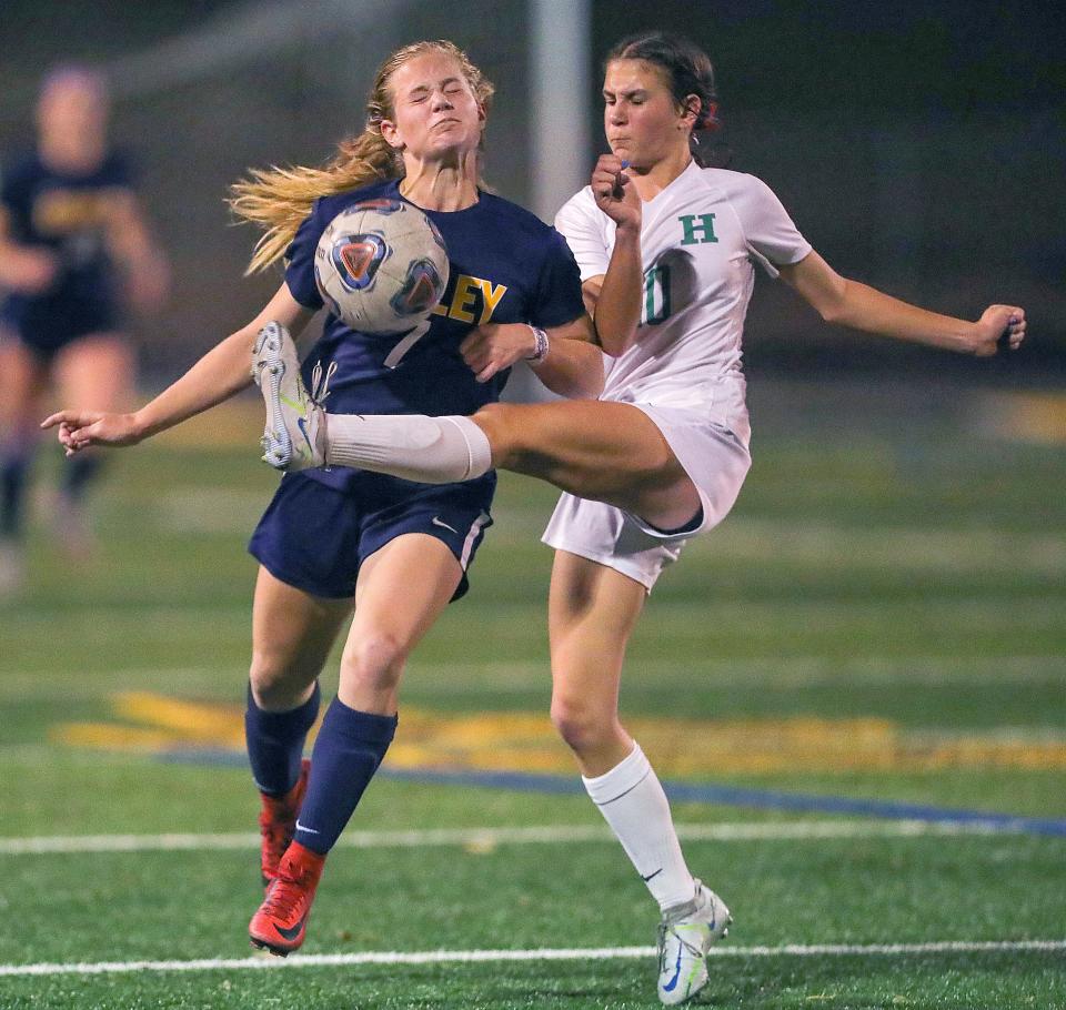 Highland's Jessica Sherman, right, clears the ball in front of Copley's Emma Stransky on Wednesday, Oct. 12, 2022 in Copley.