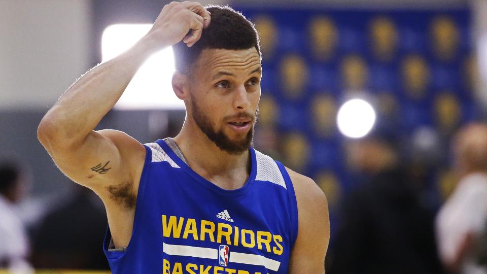 Mandatory Credit: Photo by Larry W Smith/EPA/Shutterstock (8863016f)Stephen CurryCleveland Cavaliers at Golden State Warriors, Oakland, USA - 11 Jun 2017Golden State Warriors Stephen Curry scratches his head while walking across the court during practice at the Warriors practice court in Oakland, California, USA, 11 June 2017.