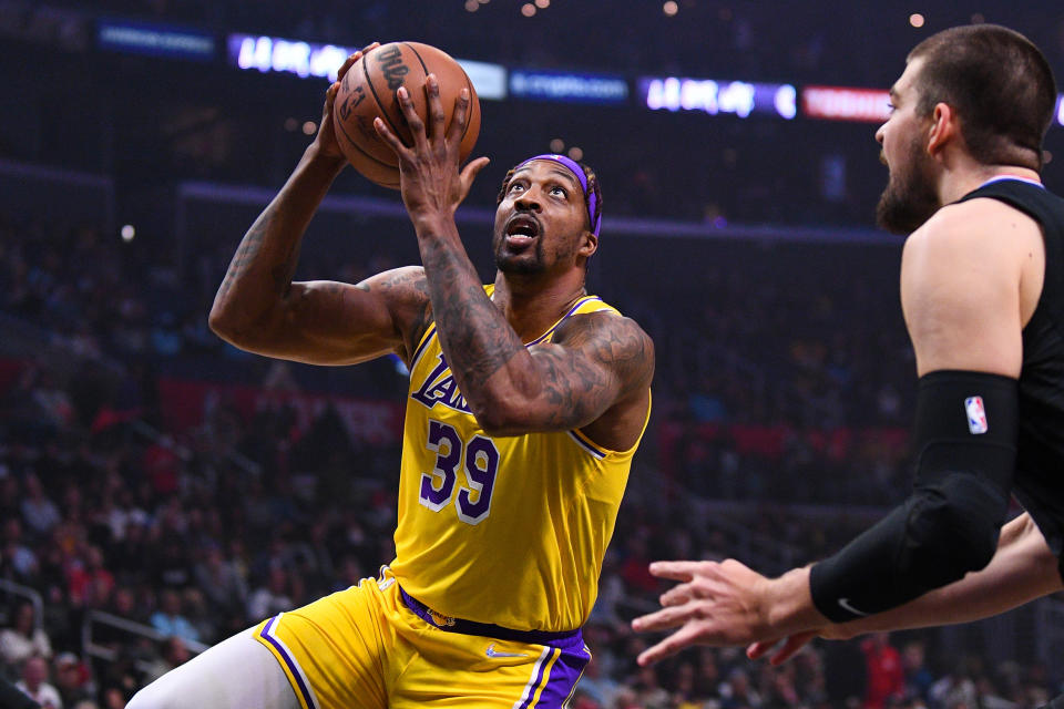 LOS ANGELES, CA - MARCH 03: Los Angeles Lakers Center Dwight Howard (39) drives to the basket during a NBA game between the Los Angeles Lakers and the Los Angeles Clippers on March 3, 2022 at Crypto.com Arena in Los Angeles, CA. (Photo by Brian Rothmuller/Icon Sportswire via Getty Images)