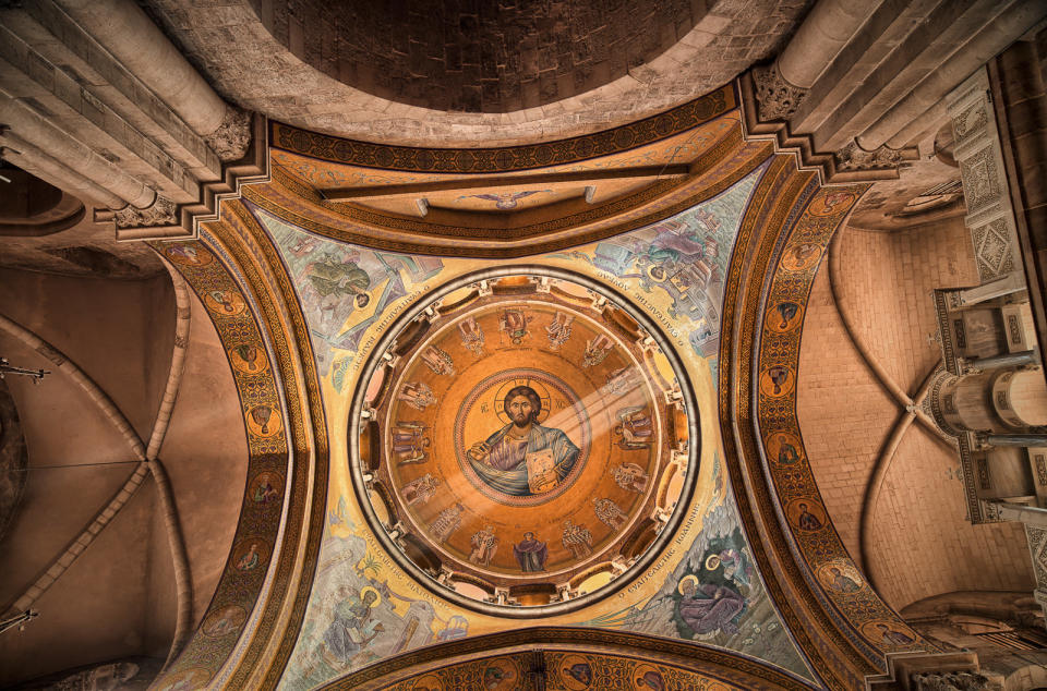 The inner dome of the Greek Orthodox Catholicon inside the Church of the Holy Sepulchre, directly above "the omphalos", once believed by Christians to mark the navel of the world