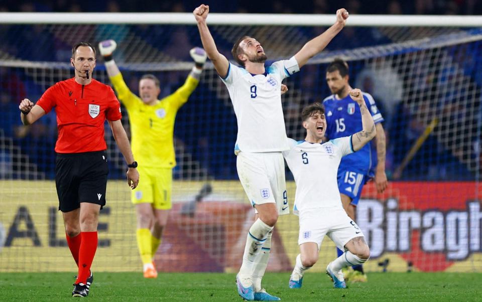 England's Harry Kane and John Stones celebrate after the match - Reuters/Peter Cziborra