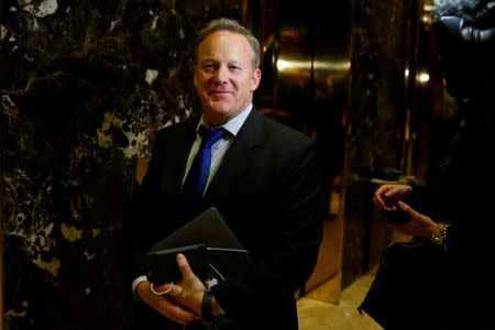 FILE PHOTO - Sean Spicer arrives in the lobby of Republican president-elect Donald Trump's Trump Tower in New York, New York, U.S. November 14, 2016. REUTERS/Carlo Allegri