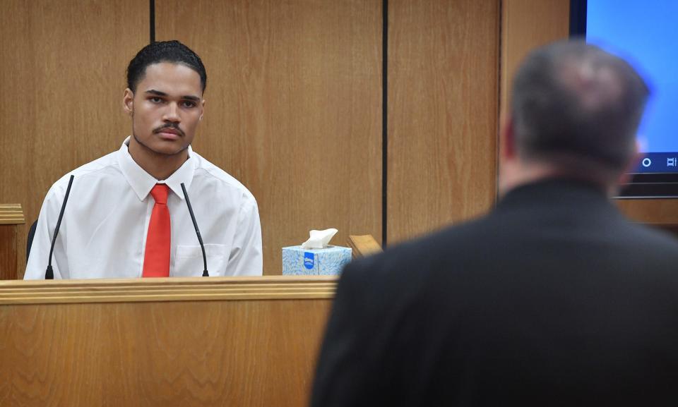 Martez Vrana, defendant in a capitol murder trial, listens as he is questioned on the witness stand by Chief Prosecutor Dobie Kosub Monday morning in 78th District Court.