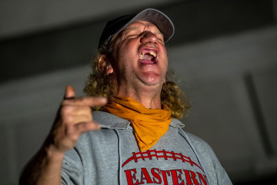 Harry Collins, founder of the Bloomington Homeless Coalition, gives an impassioned talk Dec. 11, 2020, at the Hands Off the Homeless protest in downtown Bloomington.