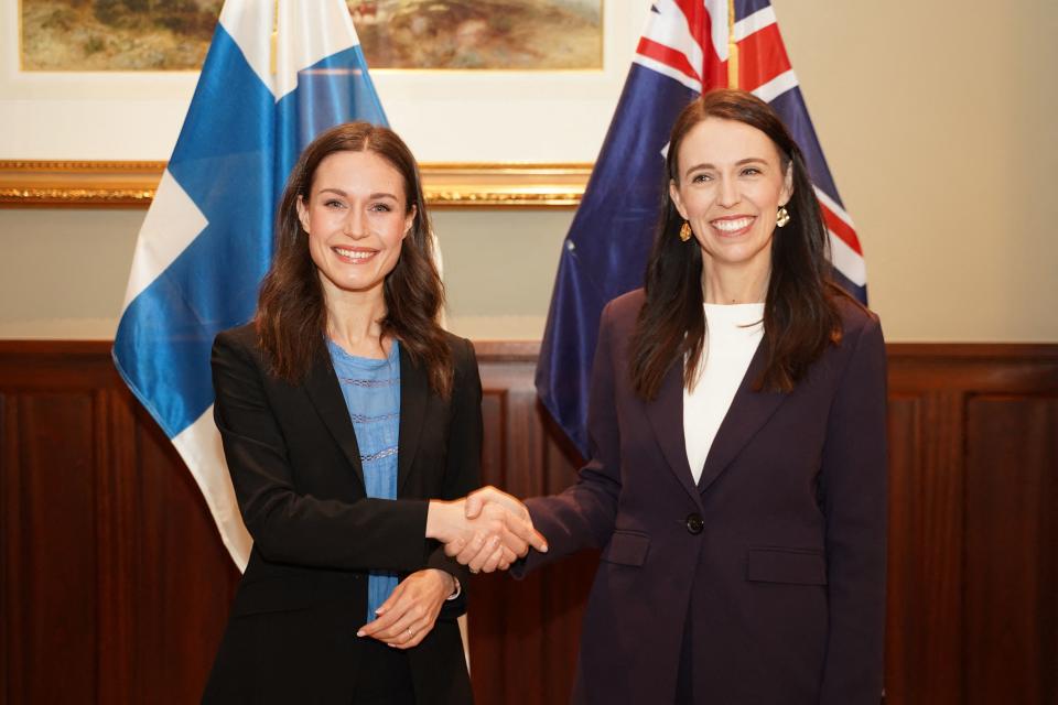 Finlands Prime Minister Sanna Marin (L) shakes hands with New Zealand's Prime Minister Jacinda Ardern during a bilateral meeting in Auckland, New Zealand, on November 30, 2022. (Photo by Diego OPATOWSKI / AFP) (Photo by DIEGO OPATOWSKI/AFP via Getty Images)