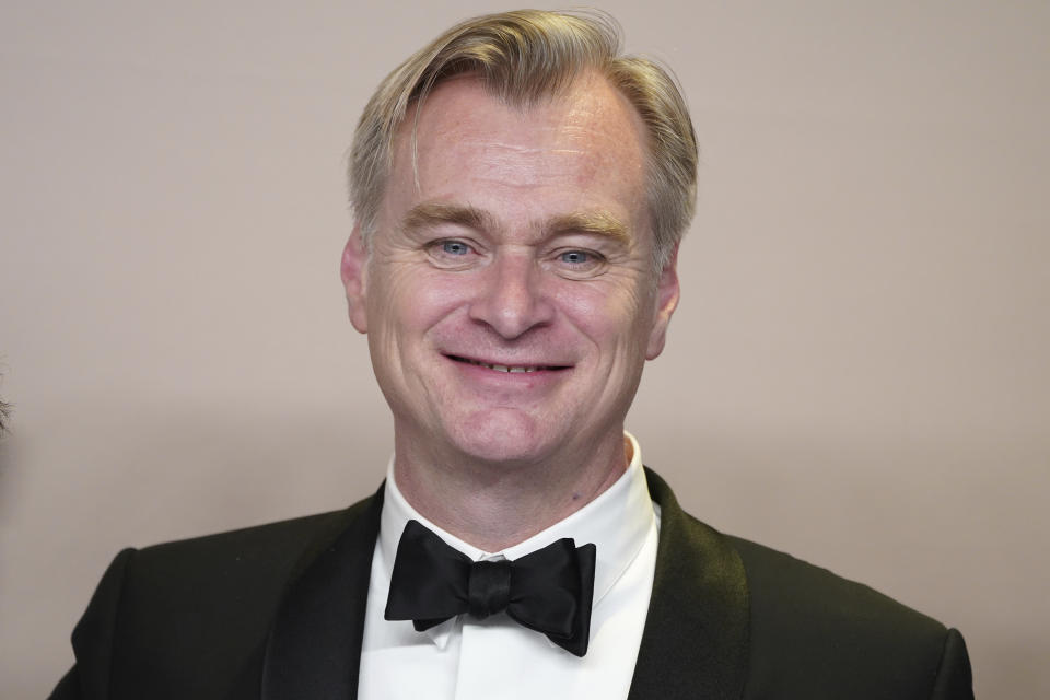 Christopher Nolan, winner of the awards for best director and best picture for "Oppenheimer," poses in the press room at the Oscars on Sunday, March 10, 2024, at the Dolby Theatre in Los Angeles. (Photo by Jordan Strauss/Invision/AP)