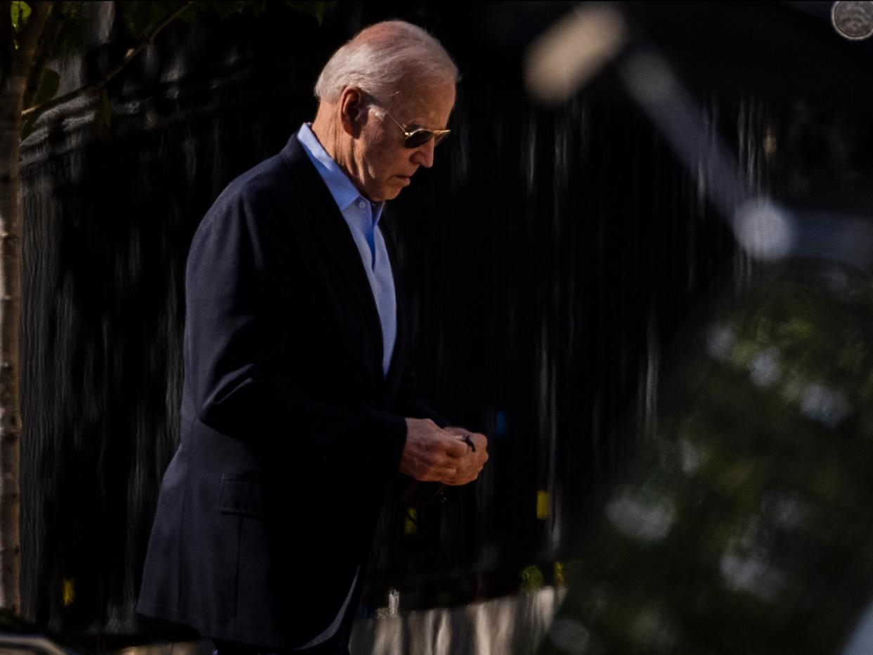 <p>President Joe Biden walks into Holy Trinity Catholic Church to attend Mass on June 5, 2021 in Washington, DC. </p> (Getty Images)