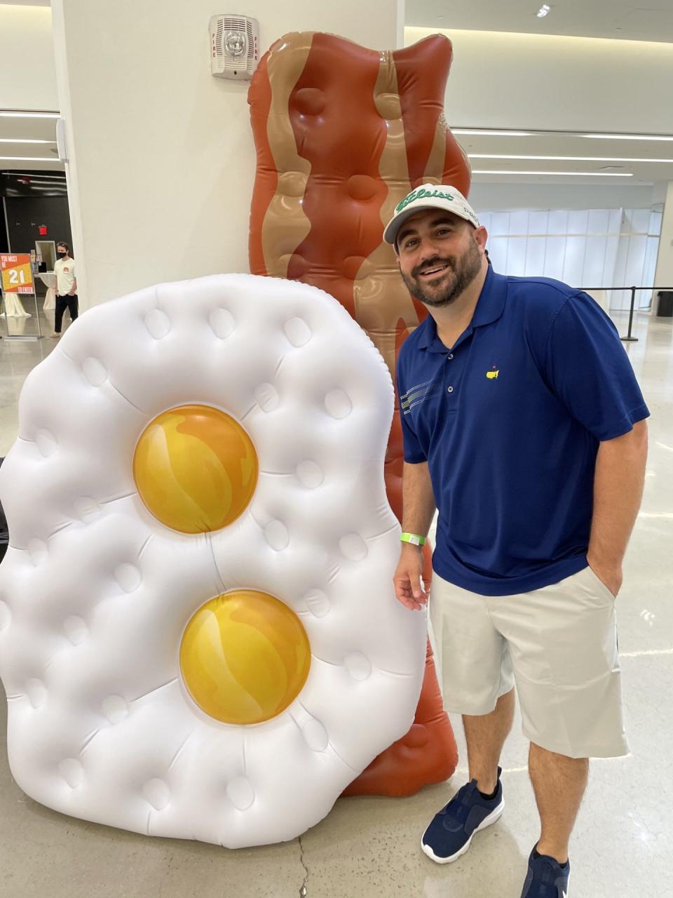 Lower Hudson Valley's own "Bacon Egg and Cheese King", Instagram influencer Phil Lockwood poses with his favorite ingredients. Lockwood says the ideal bacon, egg and cheese sandwich should have at least two eggs in the mix.