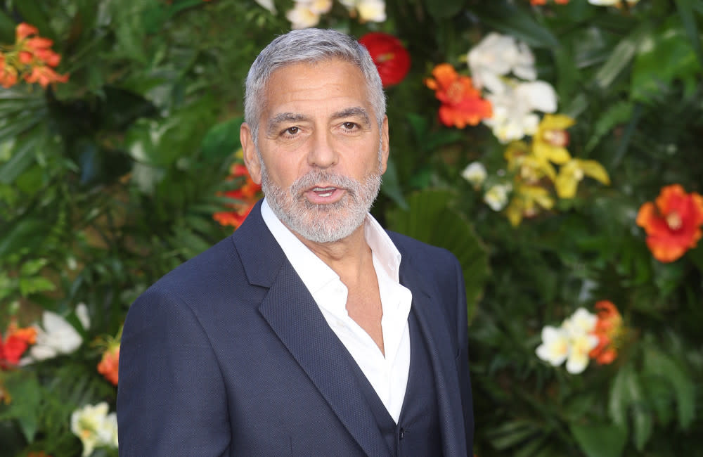 George Clooney was terrified at the idea of becoming a father to twins credit:Bang Showbiz