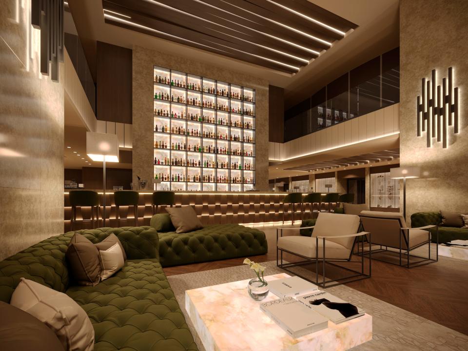 A rendering of a two-floor lobby with lounge chairs in the Explora I.