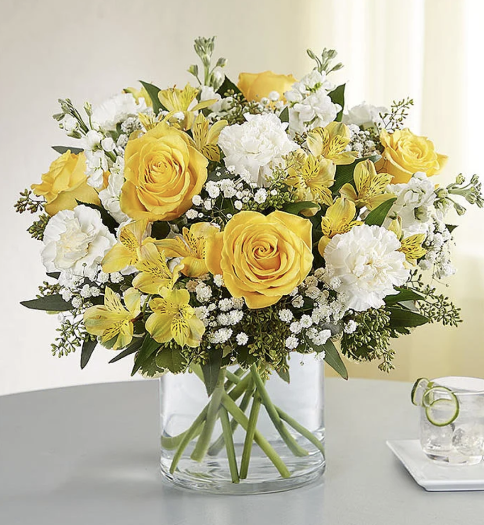 Yellow & White Delight Bouquet with yellow roses and white flowers (Photo via 1-800-Flowers)