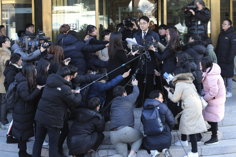 Lee Dong-joon, lawyer representing the group of Japan's wartime sex slavery victims, speaks to reporters at the Constitutional Court in Seoul, South Korea, Friday, Dec. 27, 2019. South Korea's Constitutional Court on Friday rejected a petition seeking the repeal of a 2015 deal with Japan settling a bitter dispute over Korean women enslaved for sex by the Japanese military during World War II.(AP Photo/Ahn Young-joon)