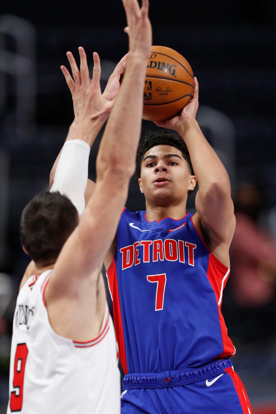 Detroit Pistons guard Killian Hayes (7) takes a shot over Chicago Bulls center Nikola Vucevic (9) during the first quarter at Little Caesars Arena on May 9, 2021.
