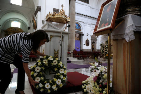 U.S. Ambassador to the United Nations Nikki Haley lays a wreath to honour Julio Vian Morales, the late Archbishop of the Archdiocese of Guatemala, at the Metropolitan Cathedral in Guatemala City, Guatemala, February 28, 2018. REUTERS/Luis Echeverria