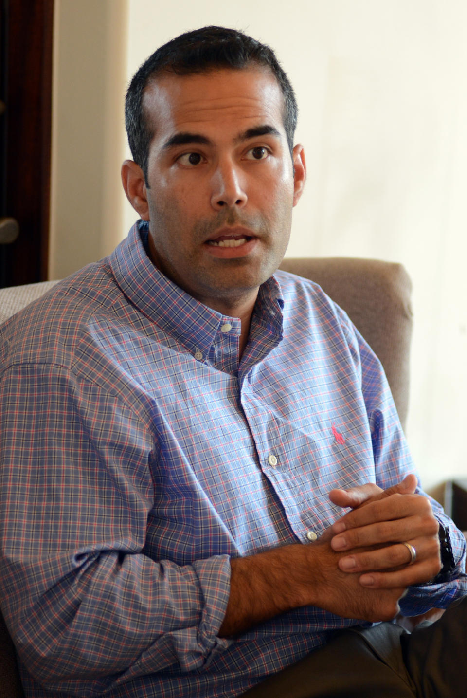 In this photo taken June 25, 2013, George P. Bush, 37, speaks during an interview with The Associated Press in Frisco, Texas. (AP Photo/Benny Snyder)  -- Son of Jeb Bush & Columba Bush -- Brother of Noelle Bush, Jeb Bush Jr. 