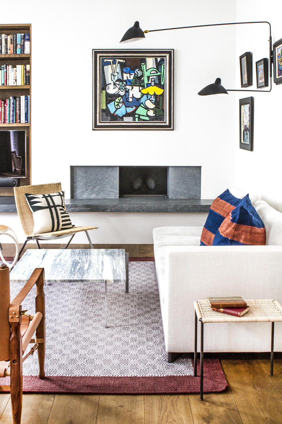 white living room with  modern furniture and glass coffee table