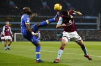 Britain Football Soccer - Aston Villa v Leeds United - Sky Bet Championship - Villa Park - 29/12/16 Leeds' Souleymane Doukara in action with Aston Villa's Mile Jedinak Mandatory Credit: Action Images / Jason Cairnduff Livepic