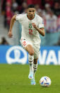 Morocco's Achraf Hakimi controls the ball during the World Cup group F soccer match between Belgium and Morocco, at the Al Thumama Stadium in Doha, Qatar, Sunday, Nov. 27, 2022. (AP Photo/Alessandra Tarantino)