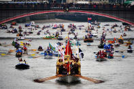 <div class="caption-credit"> Photo by: Getty Images</div>Boat Flotilla Under Lambeth Bridge. A flotilla of 1,000 boats both traditional and modern accompanied the Royal Family down the Thames river in London.