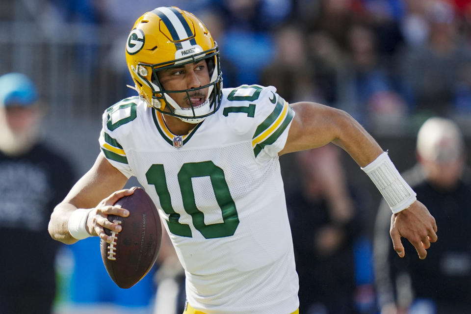 Green Bay Packers quarterback Jordan Love passes against the Carolina Panthers during the first half of an NFL football game Sunday, Dec. 24, 2023, in Charlotte, N.C. (AP Photo/Rusty Jones)