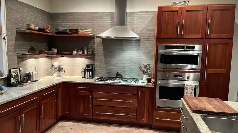 The kitchen of Zack Albert and Becca Bellamy is clean and modern -- almost too nice for the home of the three young men from Please Don’t Destroy.