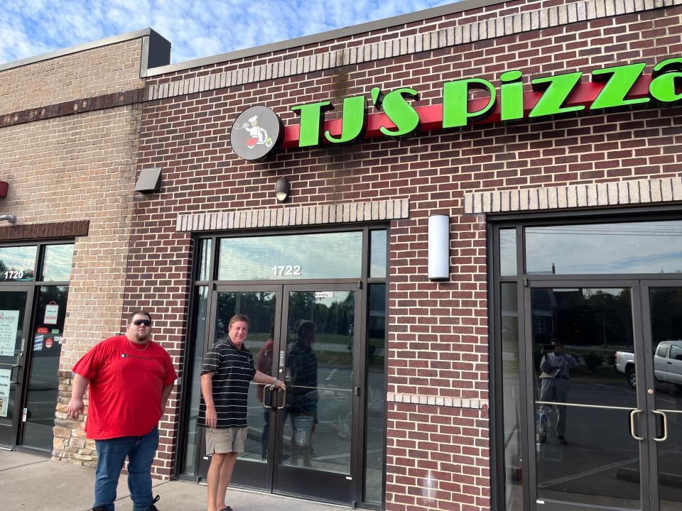 Tom Courtney and Blake West outside TJ's Pizza & Wine that will open at The City Center in Mt. Juliet.