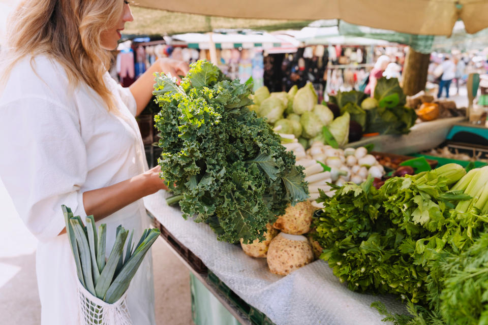 A woman looking at produce