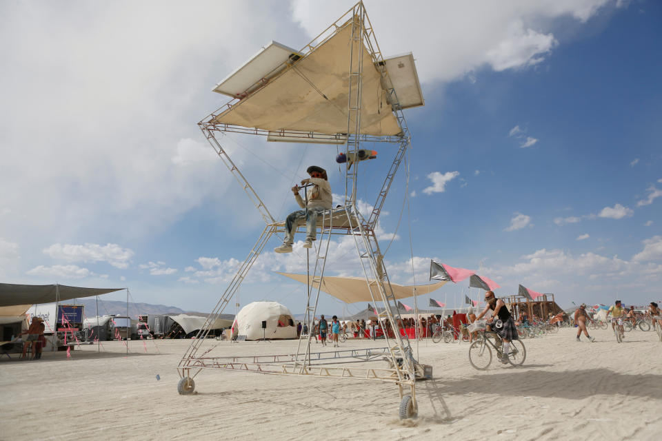 <p>A participant drives an art car as approximately 70,000 people from all over the world gathered for the annual Burning Man arts and music festival in the Black Rock Desert of Nevada, Aug. 30, 2017. (Photo: Jim Urquhart/Reuters) </p>