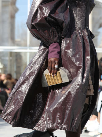 A model presents a creation by Bottega Veneta during the Milan Fashion Week in Milan, Italy February 22, 2019. REUTERS/Alessandro Garofalo