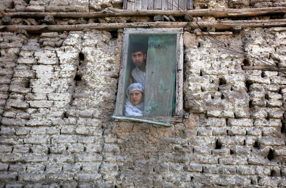 People watch protest in Kashmir