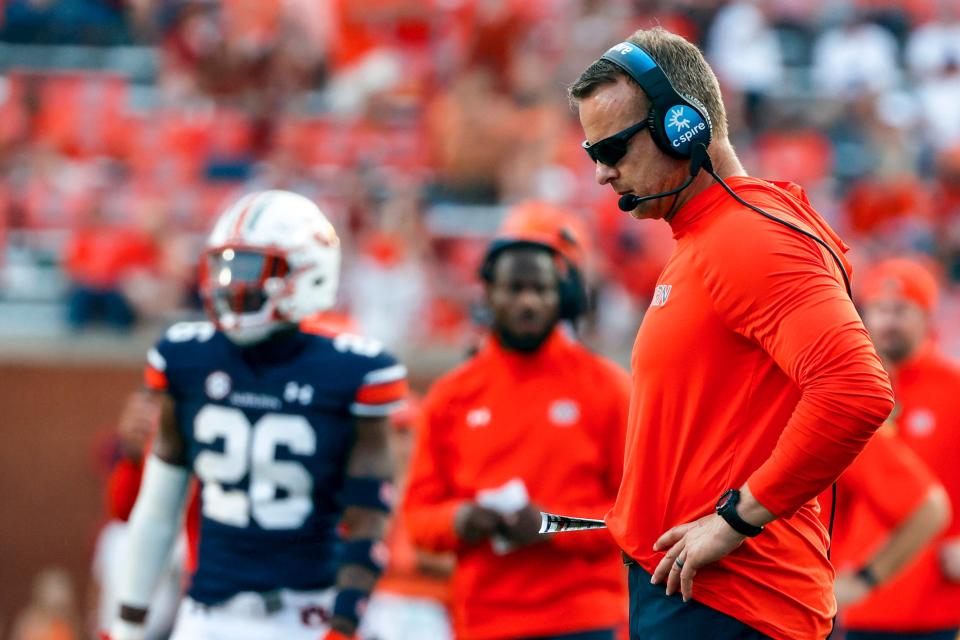 Auburn head coach Bryan Harsin reacts after a turnover during the second half of an NCAA college football game against Penn State, Saturday, Sept. 17, 2022, in Auburn, Ala. (AP Photo/Butch Dill)