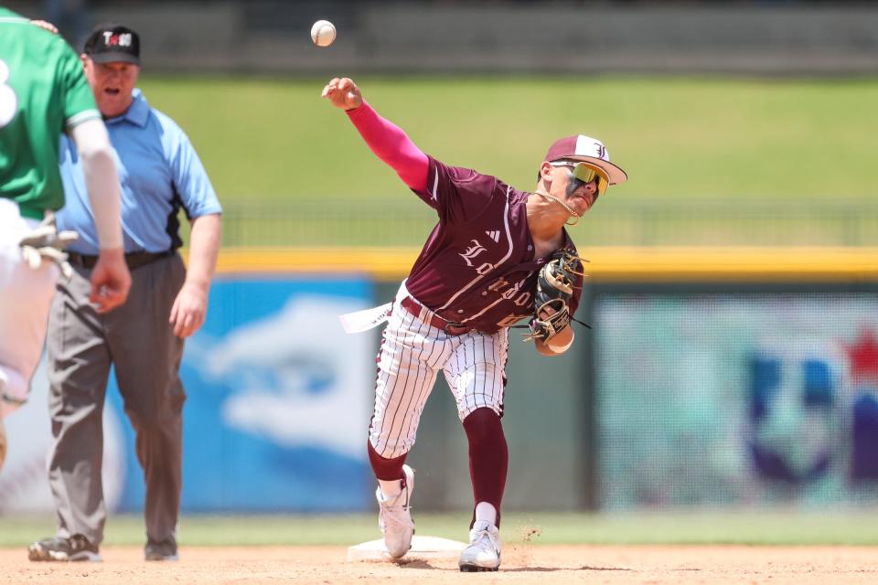 London's RJ Olivares fields a ball to first base after forcing an out at second during the Class 3A semifinal on Friday, June 9, 2023, at Dell Diamond in Round Rock, Texas.