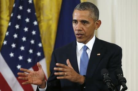 U.S. President Barack Obama addresses a joint news conference with French President Francois Hollande in the East Room of the White House in Washington November 24, 2015. REUTERS/Carlos Barria