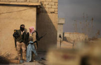 Iraqi forces backed by tribal militias during battle to retake a village from the Islamic State on the eastern bank of the river Tigris, Iraq December 7, 2016. REUTERS/Mohammed Salem