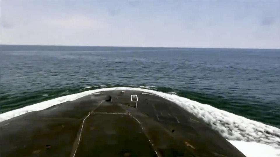 In this undated video grab provided by Russian Defense Ministry Press Service, A Russian submarine surfaces during naval manoeuvres in the Bering Sea. The Russian navy has conducted massive war games near Alaska involving dozens of ships and aircraft, the biggest such drills in the area since the Soviet times. (Russian Defense Ministry Press Service via AP)