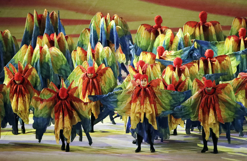 <p>Costumed dancers perform during the closing ceremony in the Maracana stadium at the 2016 Summer Olympics in Rio de Janeiro, Brazil, Sunday, Aug. 21, 2016. (AP Photo/Charlie Riedel) </p>